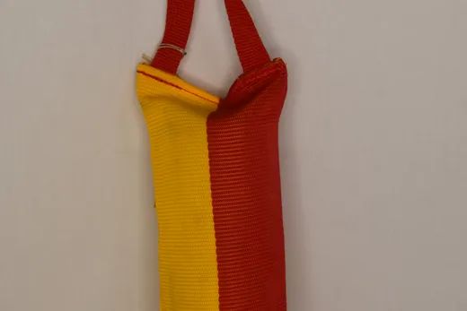 Hundespielzeug Beisswulst Nylon gelb-rot mit Schlaufe